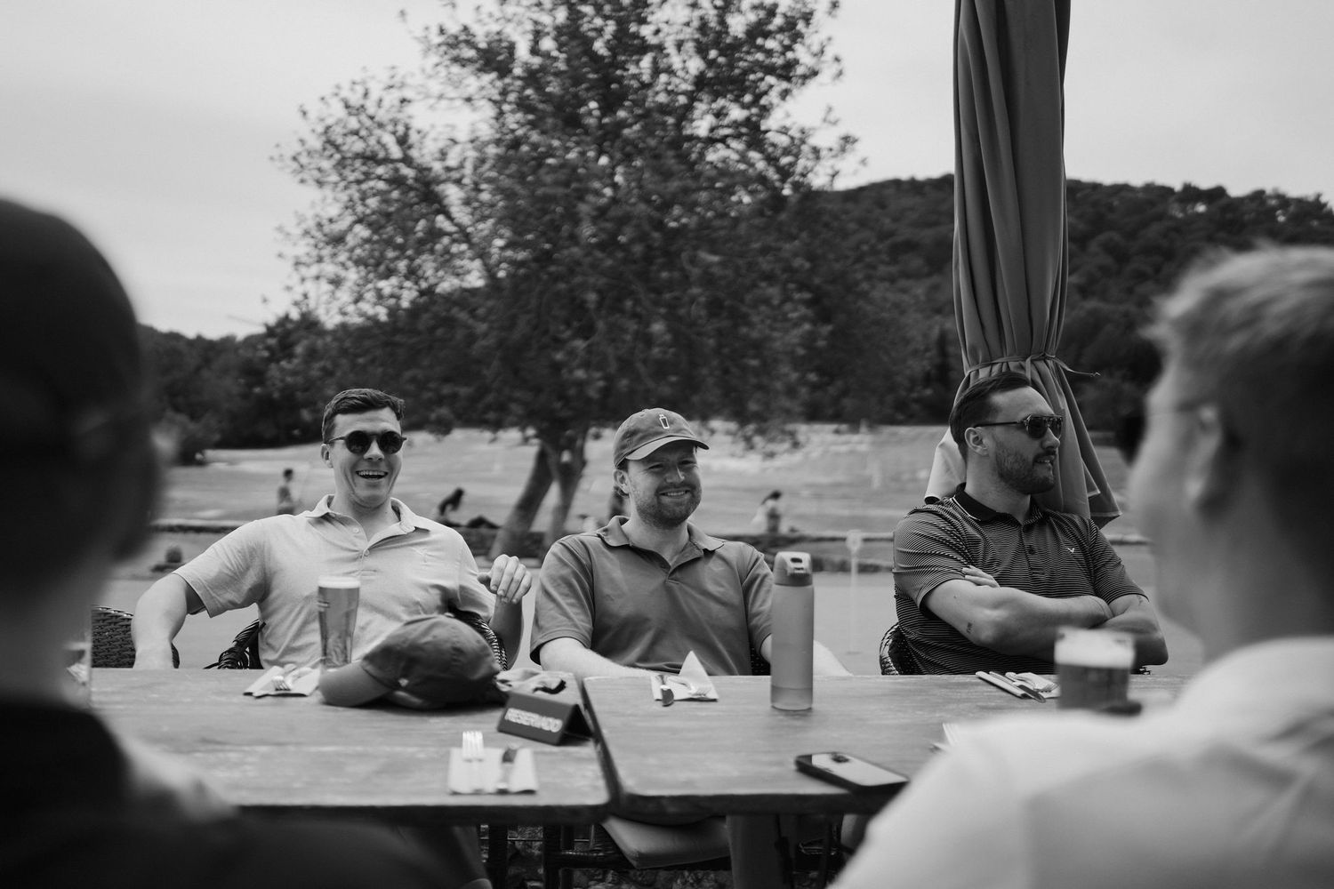 groom and groomsmen having drinks after golf at golf ibiza