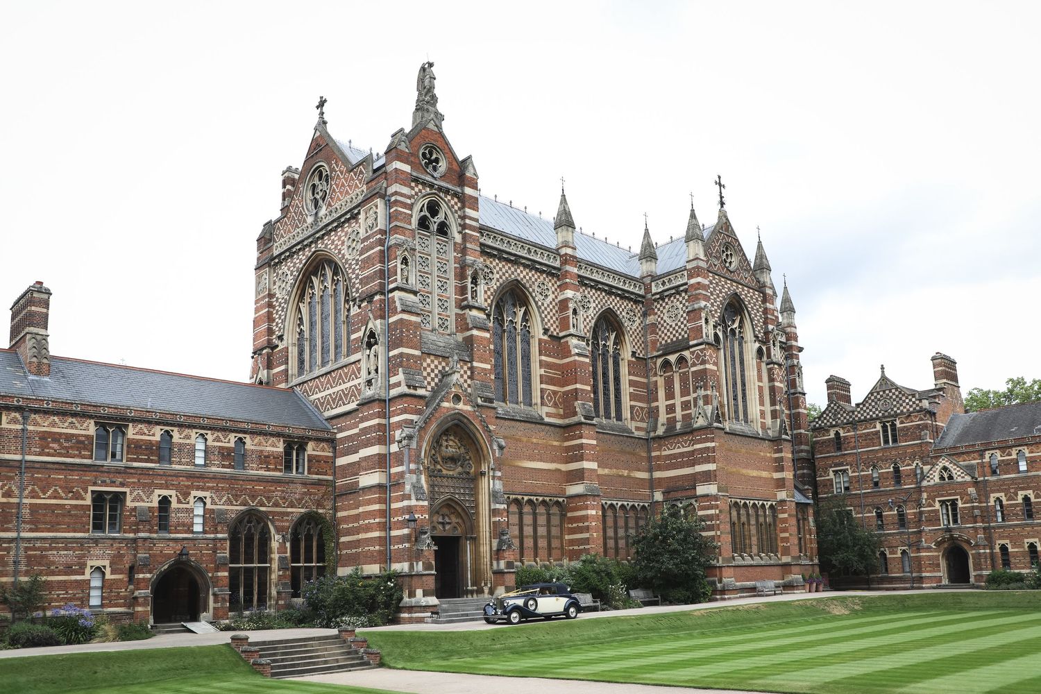 Gothic Victorian brick chapel at Keble College, Oxford University, featuring ornate stonework and tall arched windows.