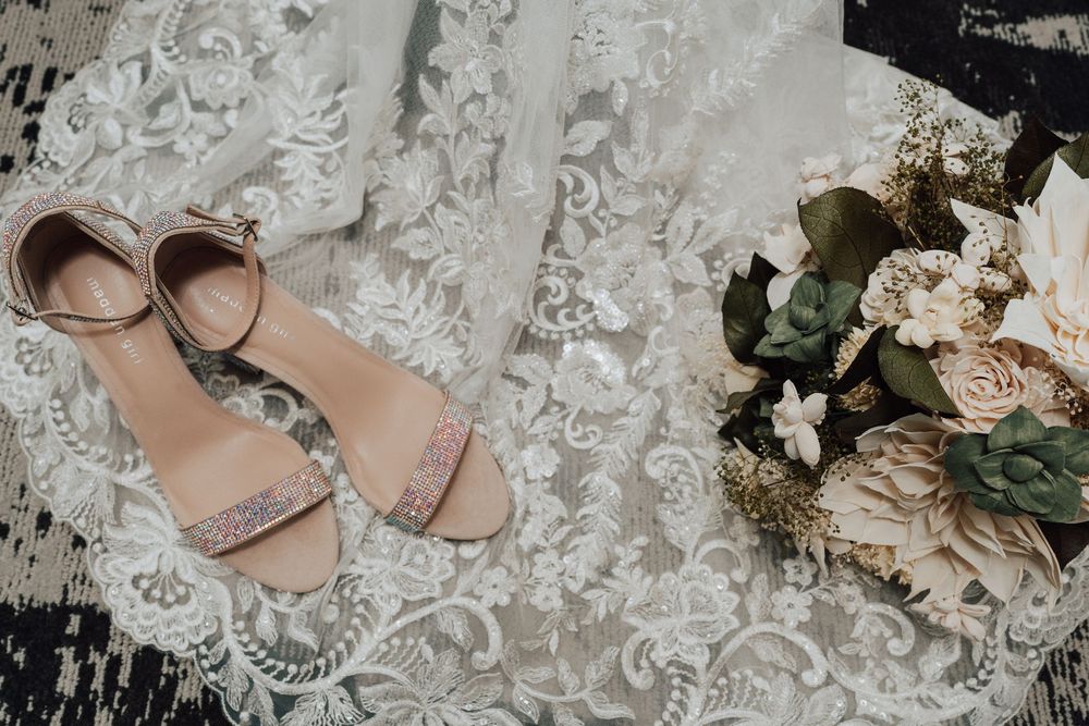 Bride’s rhinestoned wedding heels with lace wedding dress at Yorktowne Hotel winter wedding in York PA