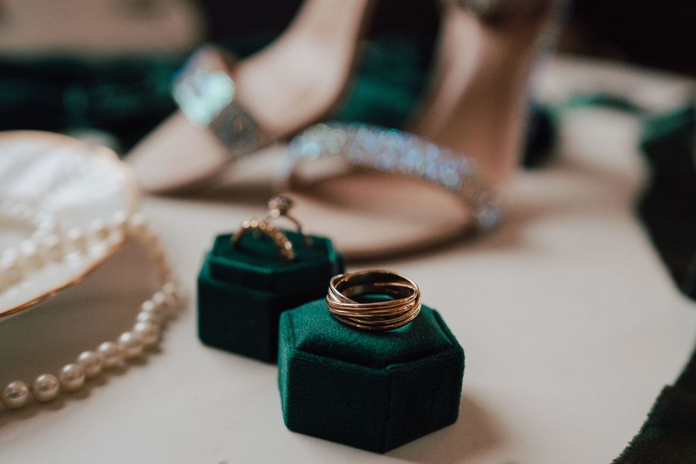 Bridal emerald green wedding ring in ring box and pearl jewelry at Yorktowne Hotel wedding in York PA