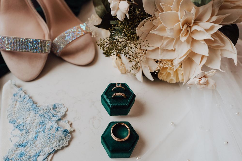 Bride’s rhinestoned wedding heels with ivory floral bouquet and velvet ring box at Yorktowne Hotel winter wedding in York PA