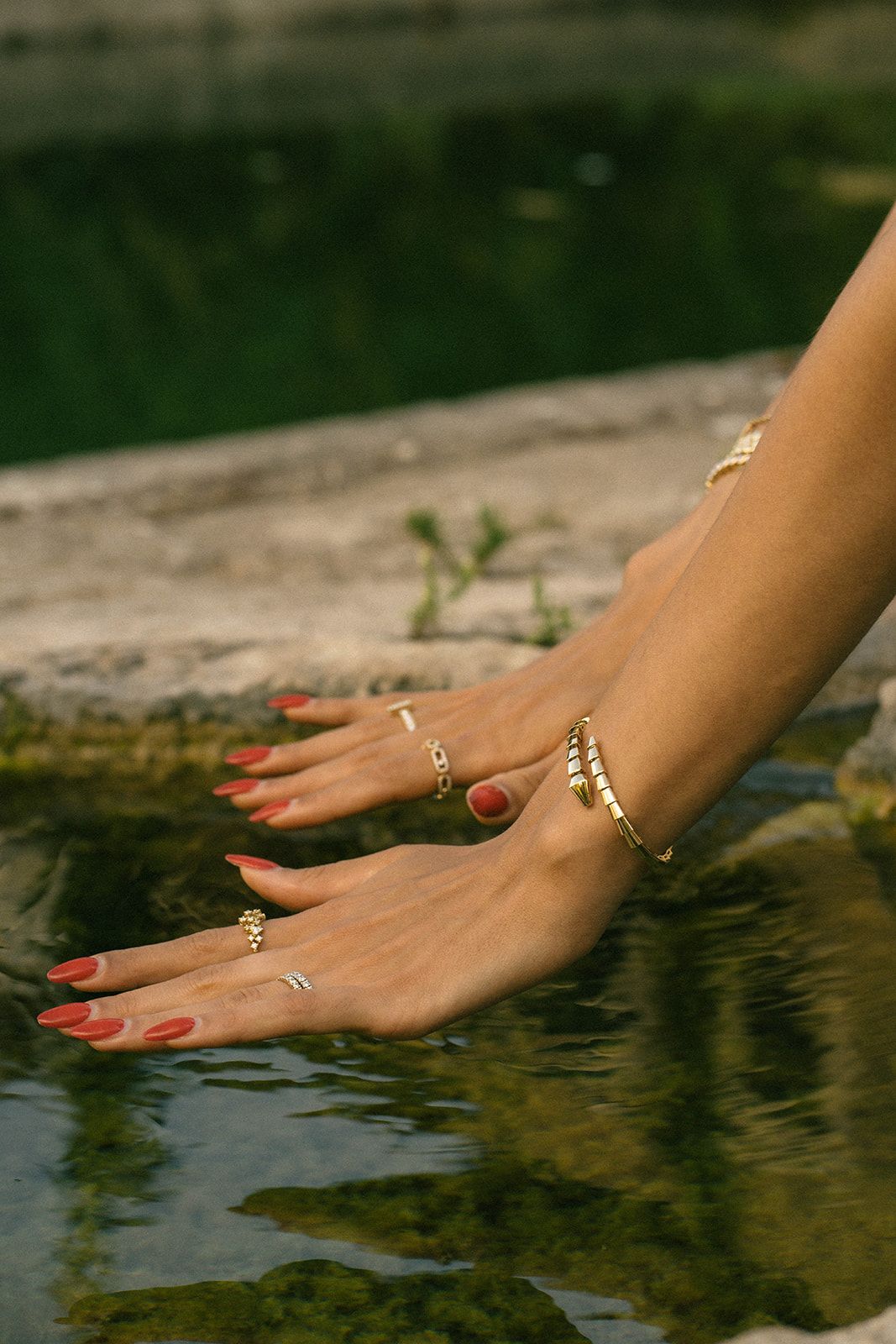 hands touching water in Valldemossa