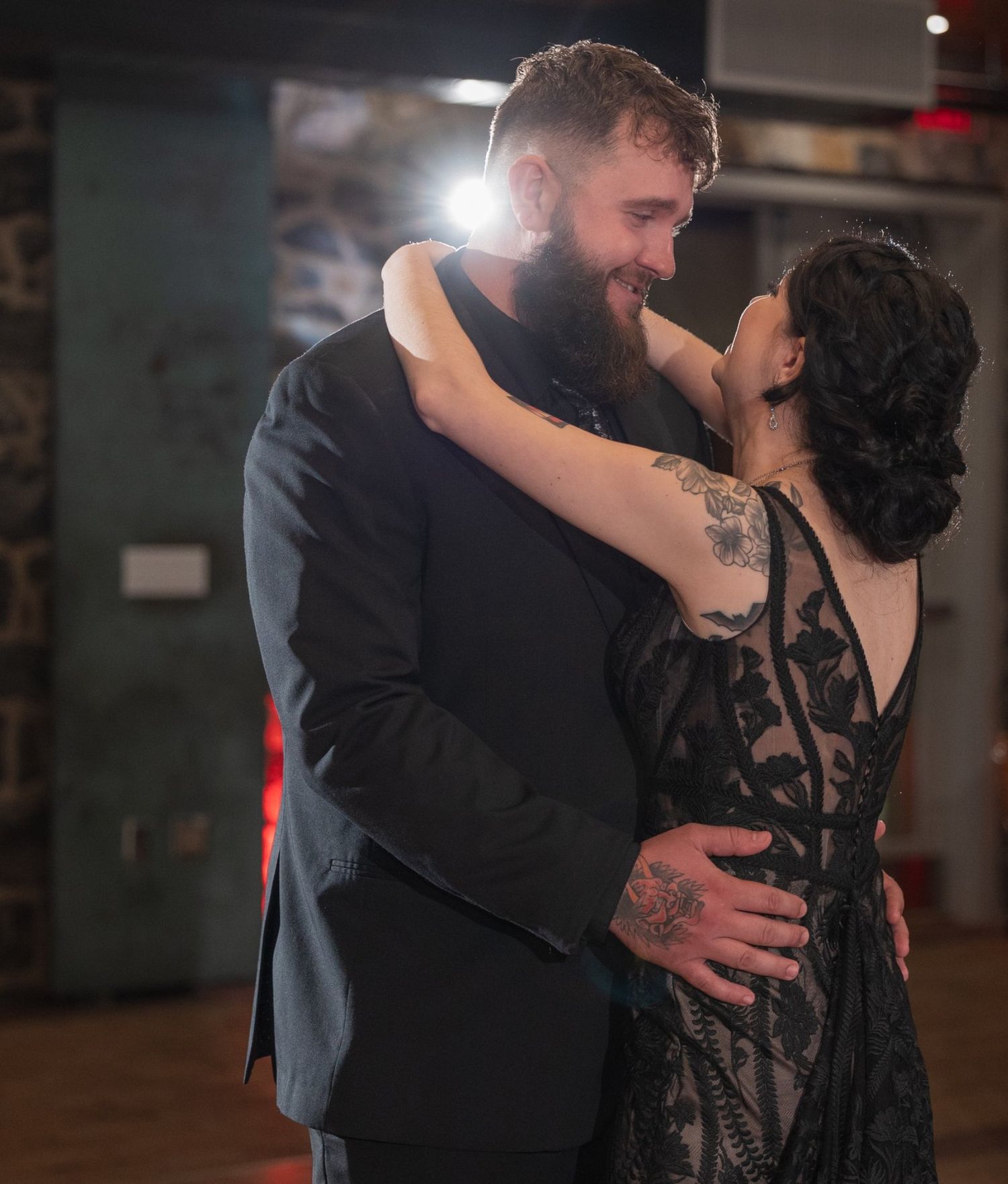 Bride and groom sharing a moment during the reception portion of a Delaware wedding day timeline