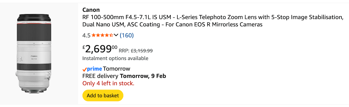 Canon RF 70-200mm f/2.8L IS USM telephoto zoom lens with white exterior and red ring shown with product packaging.