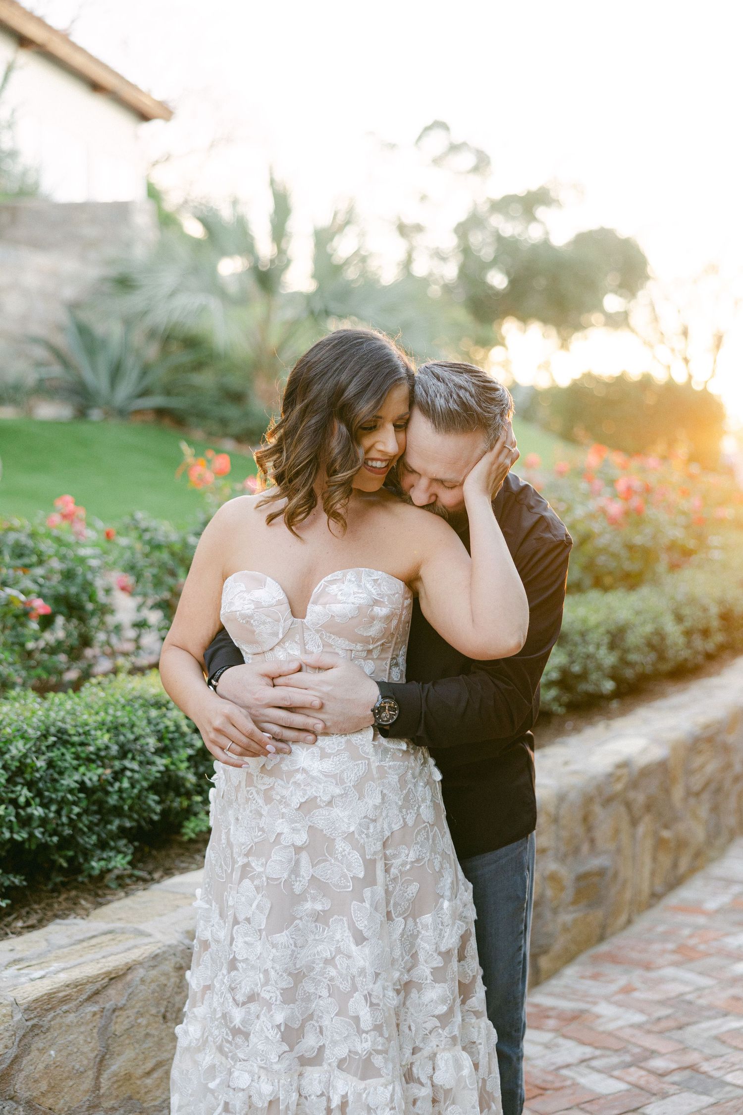 couple hugging in garden