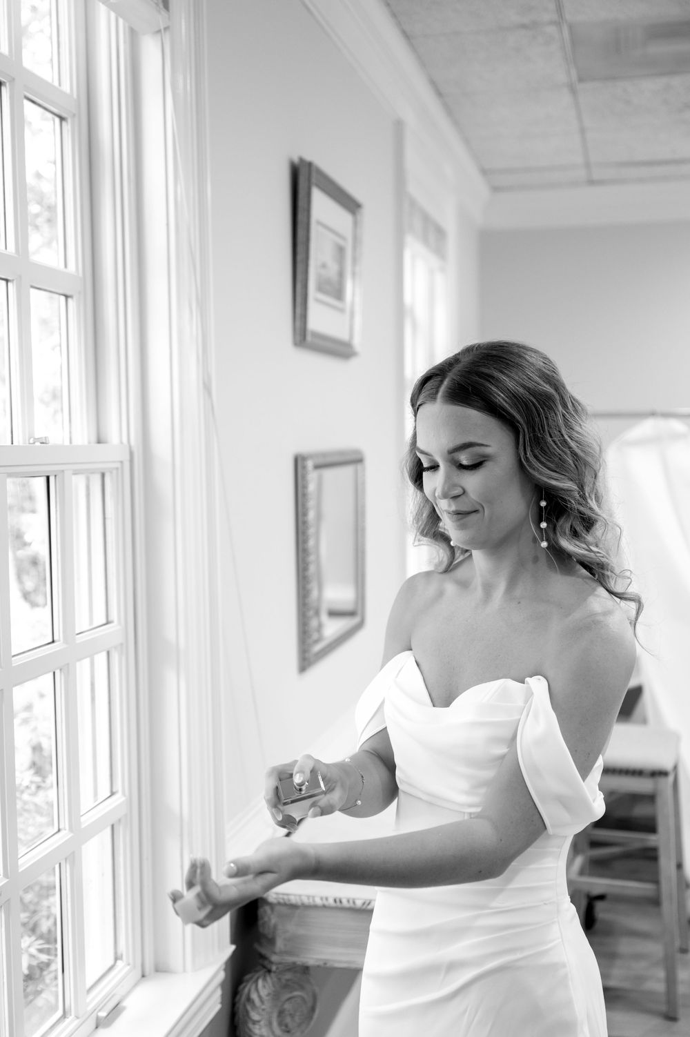 Black and white series of joyful dancing moments in a wedding dress.