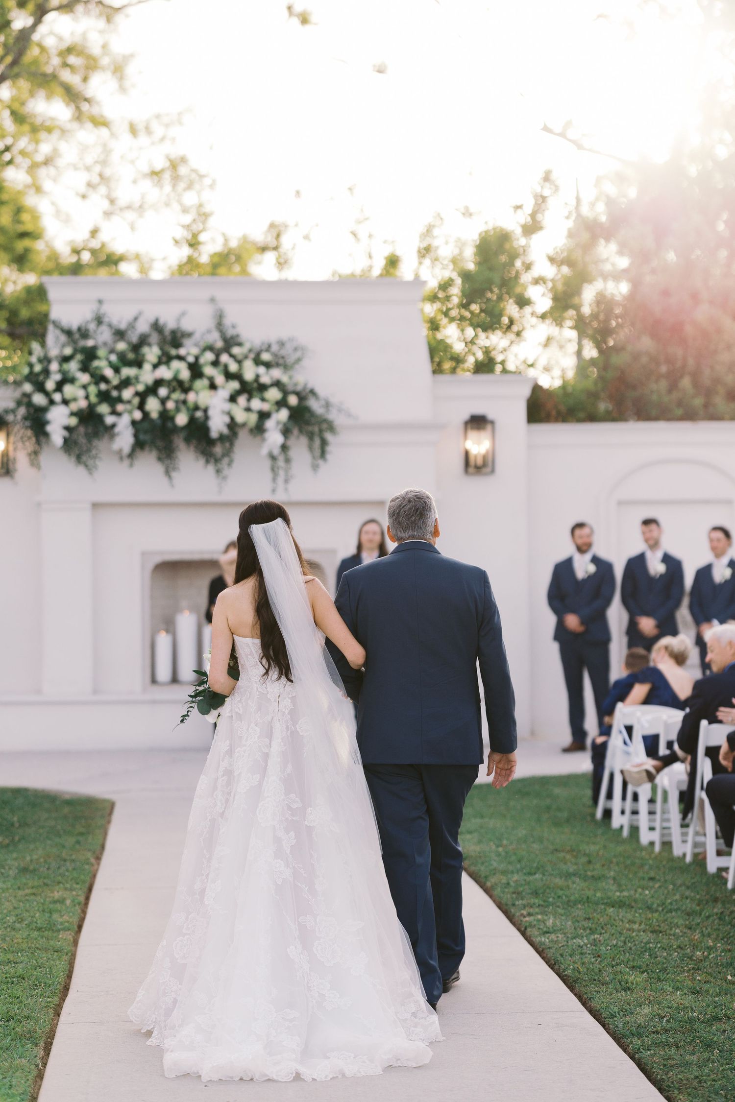 Bride and dad walking to the altar at Milicevic Vineyards in Abita Springs, LA.