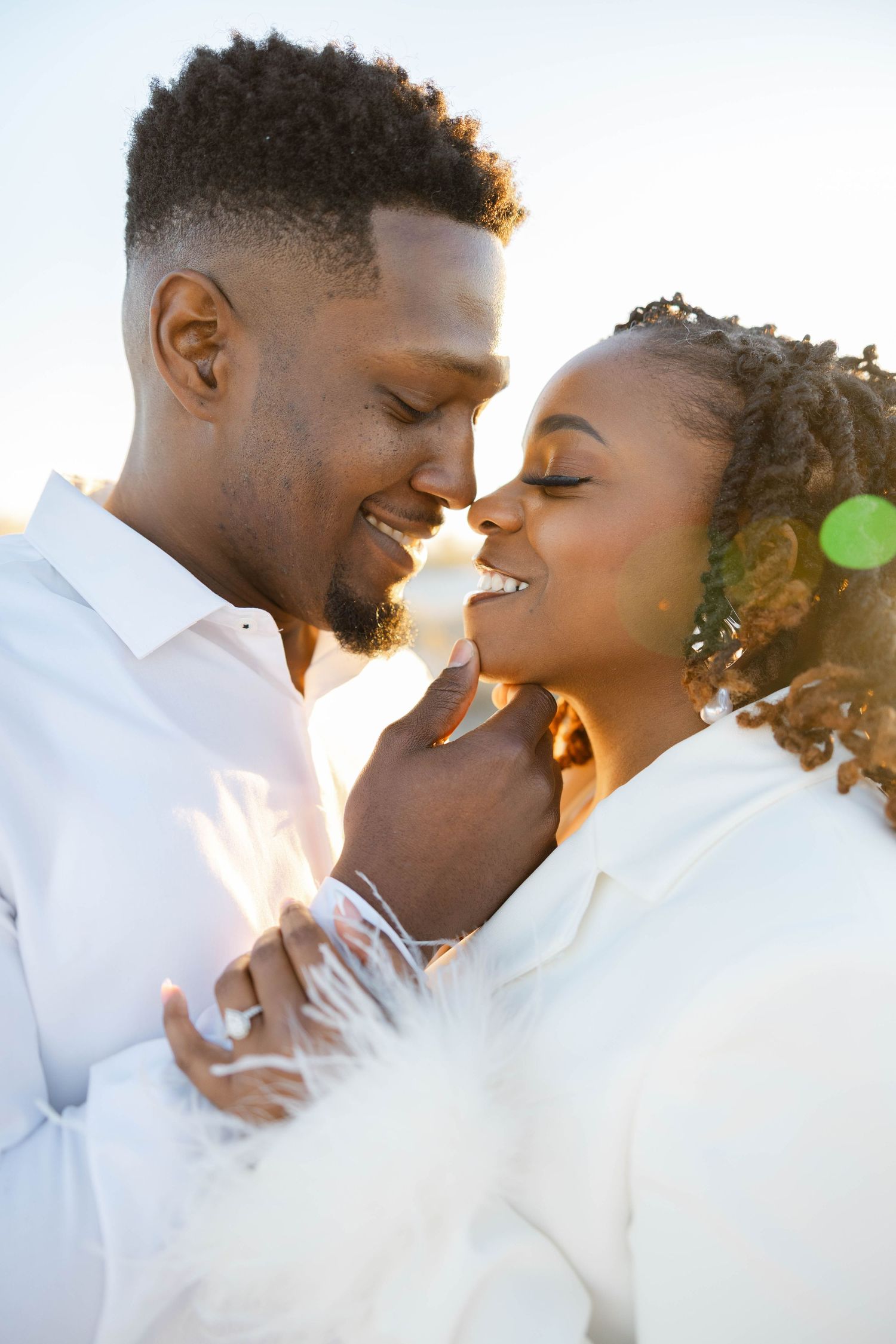 romantic couples embracing for engagement session.