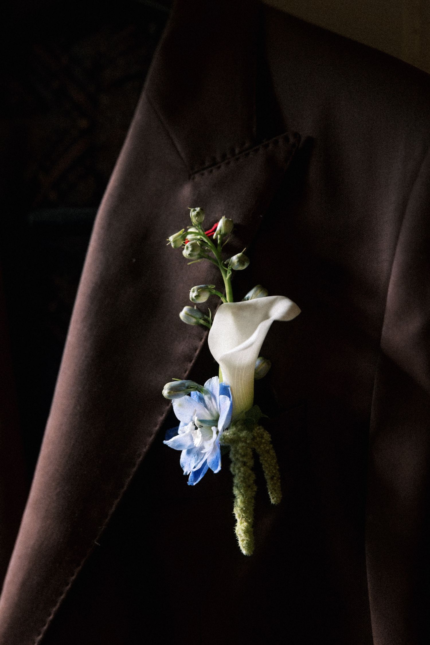 Elegant groom floral boutonniere during a Portugal wedding