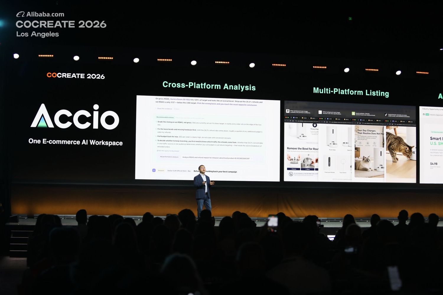 Speaker presenting on stage at Alibaba.com CoCreate 2026, with large presentation screens and a seated audience