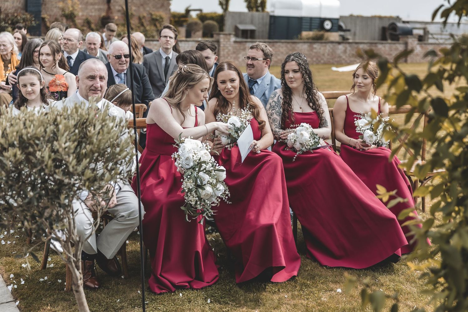 Real wedding moments laughter guests candid photography.