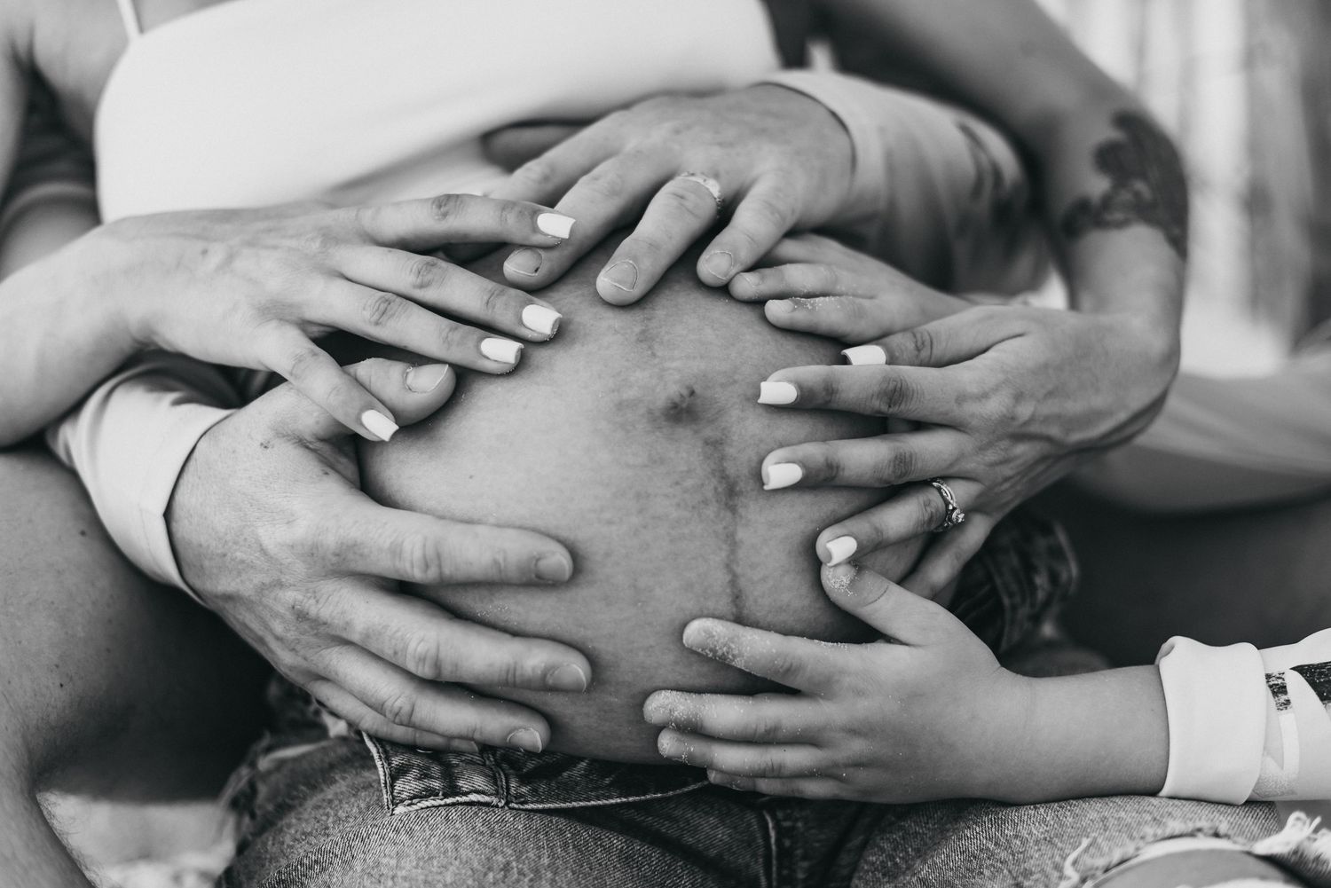 Candid Family photographer in Destin Florida with natural style. Best Maternity Photographer on the emerald coast beaches. Mom with kids.
