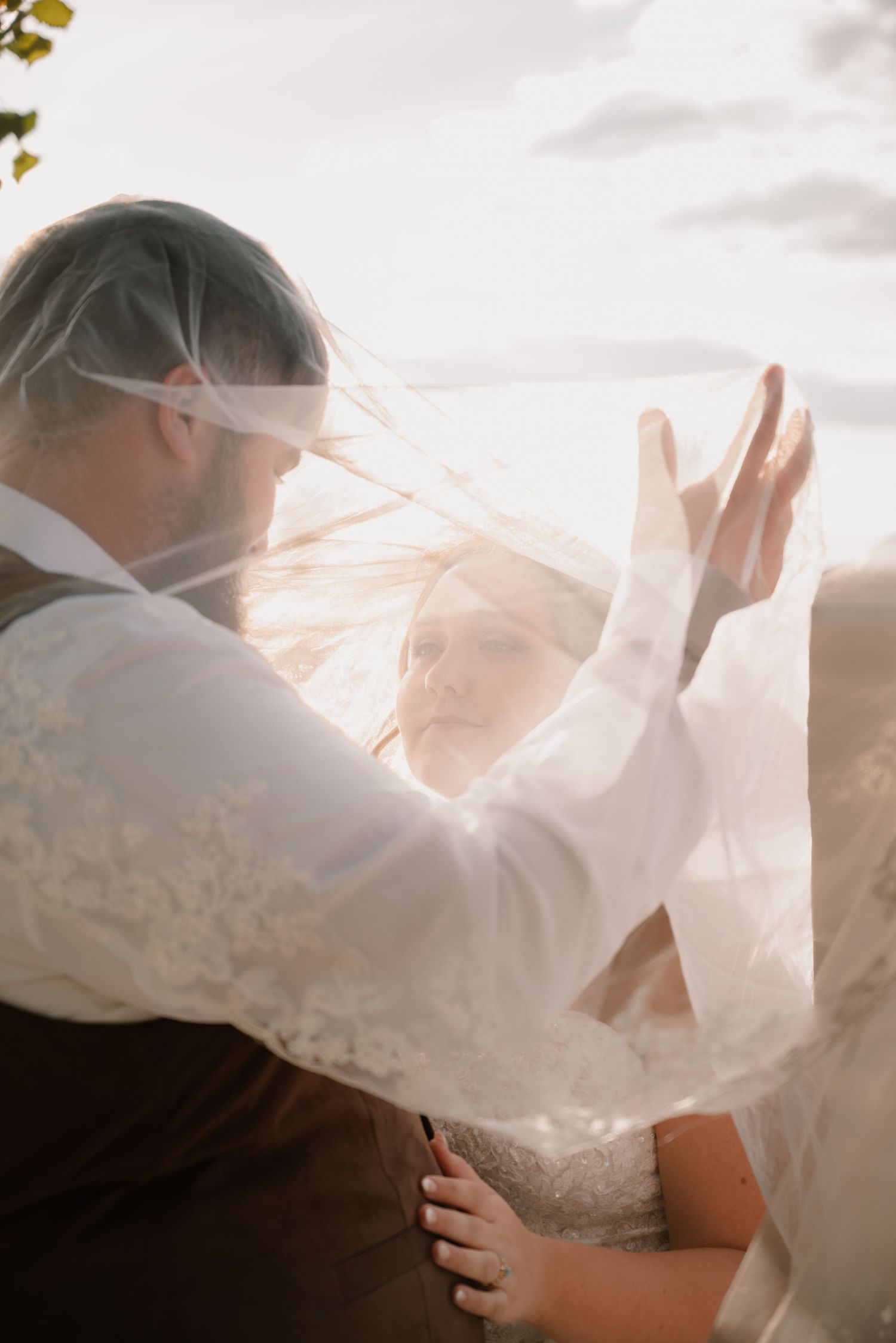 Western-inspired wedding portrait featuring a bride and groom.
