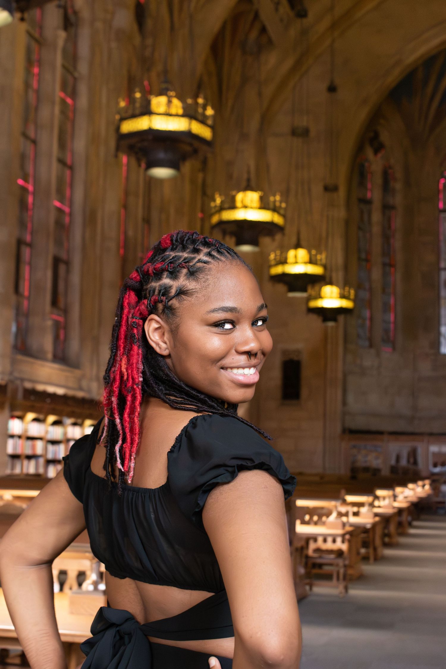 Class of 2026 senior portrait inside Suzzallo Library at the University of Washington in Seattle, Washington.