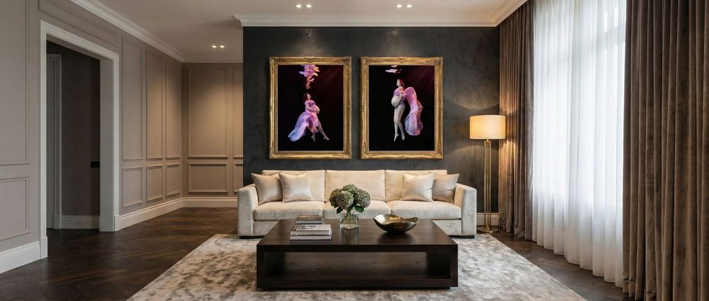 Luxurious hotel suite interior with elegant furnishings, neutral tones, and floor-to-ceiling windows offering natural light.
