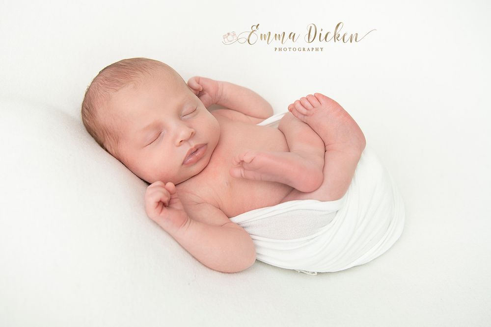 baby swaddled photo baby hammock photo Emma Dicken Photography