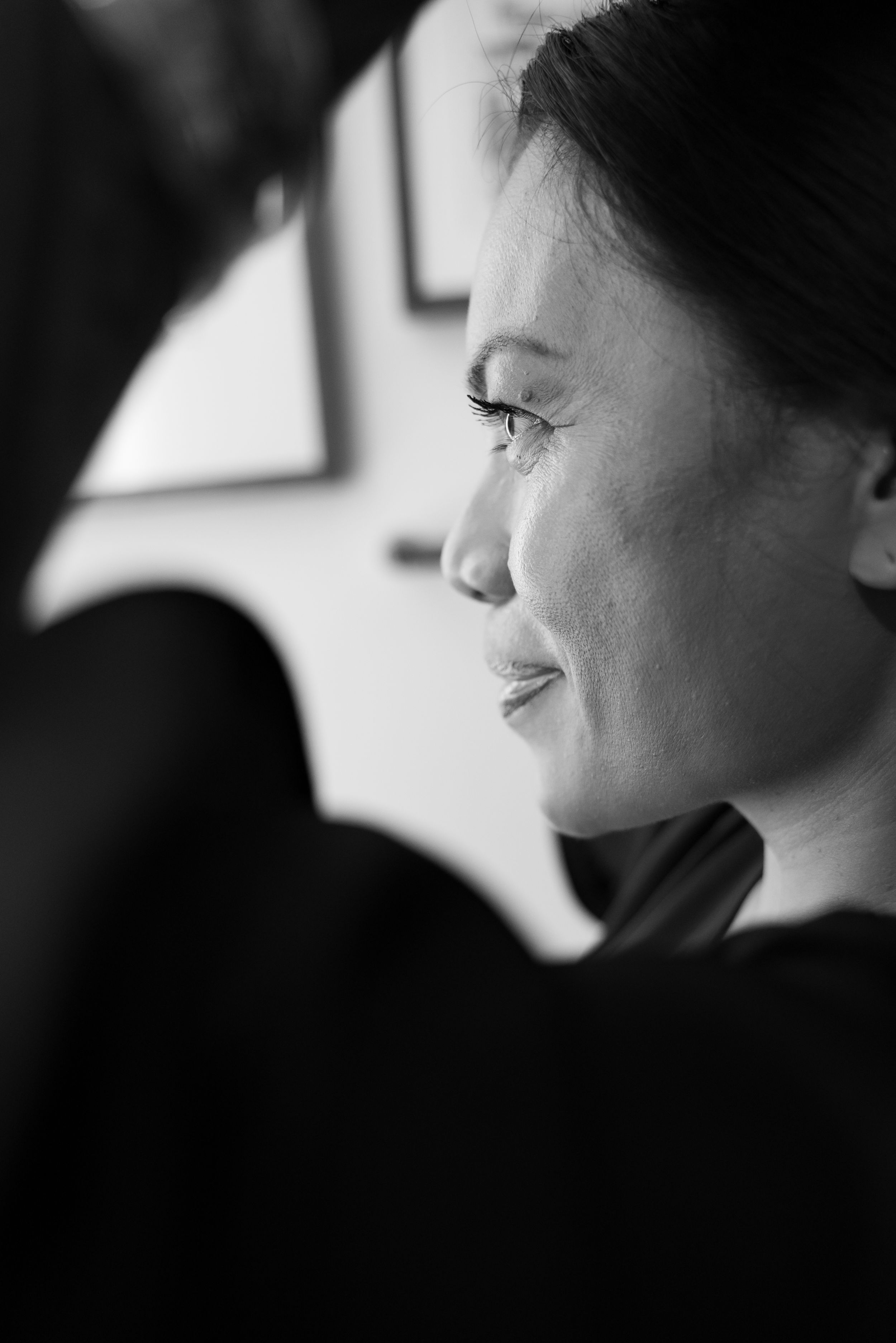 A series of black and white profile silhouettes showing different angles of a person's face in dramatic lighting.