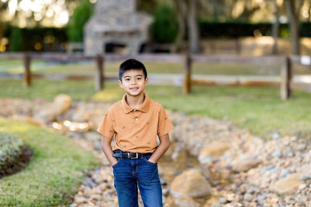 A series of outdoor portrait photographs taken in a park setting with autumn leaves and natural lighting.