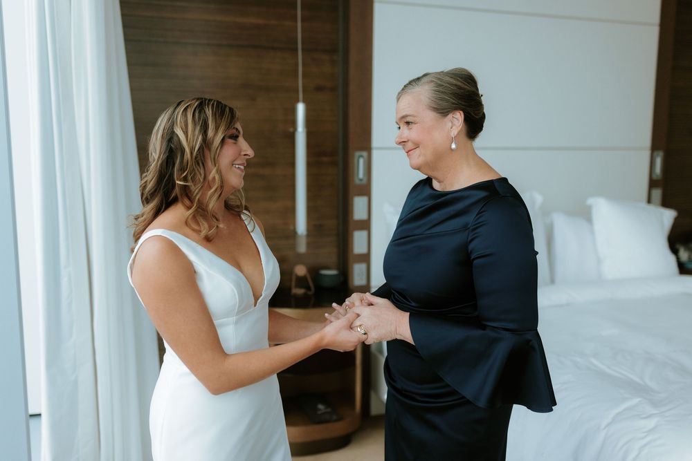 A series of candid moments between people in formal attire sharing emotional interactions in a bright indoor setting.