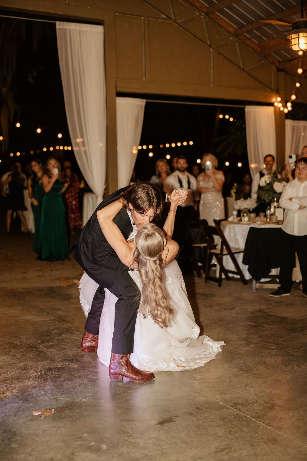 Bride and groom dance at wedding reception at The Elms of Coosada in Coosada, Alabama
