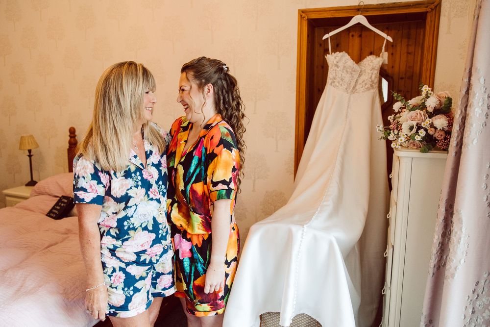 A series of wedding preparation photos showing dress fittings and getting ready moments in a bright interior space.