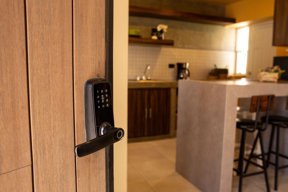 Modern interior hallway with warm lighting features dark wood accents and sleek contemporary design elements.