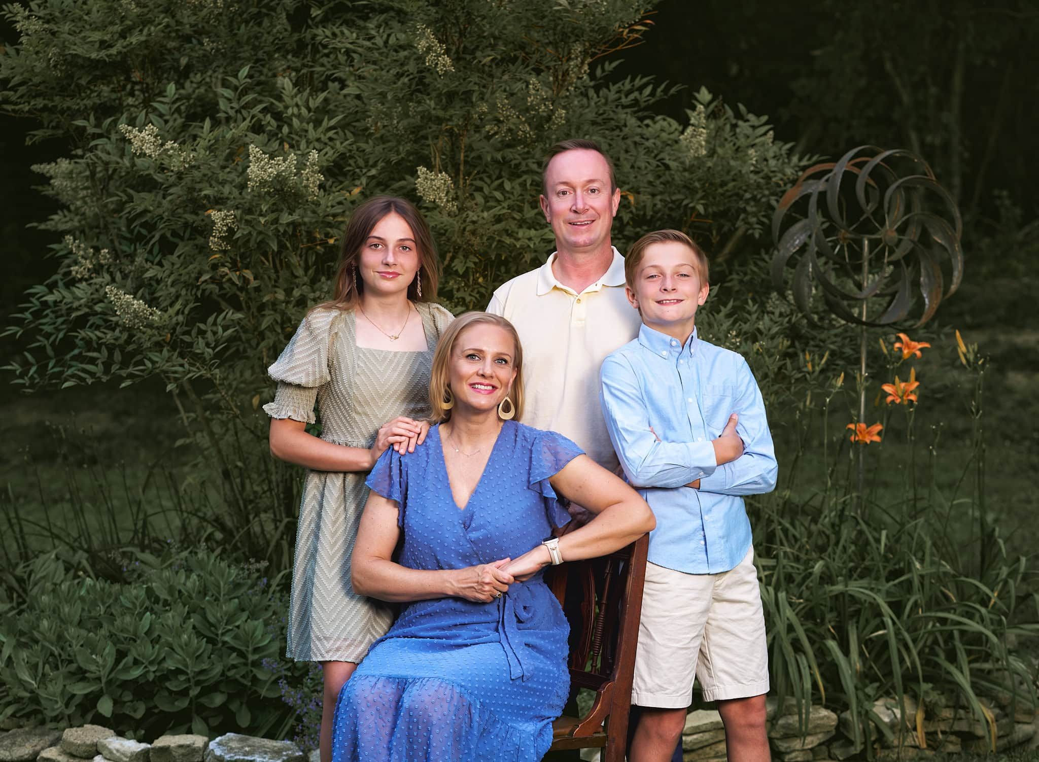 Family of four proudly posed in their back yard garden outside Baltimore