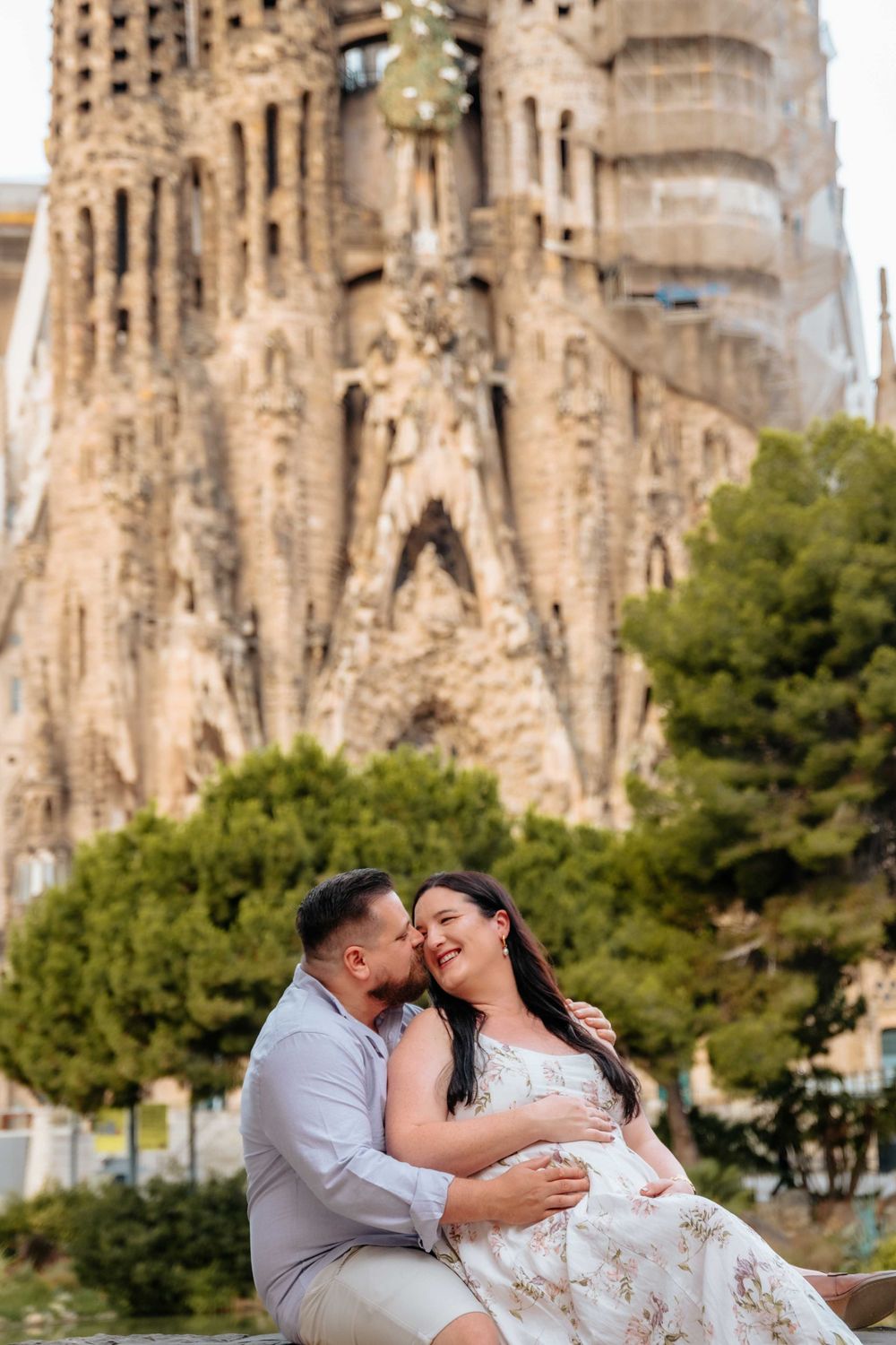 Candid maternity couple Sagrada Familia