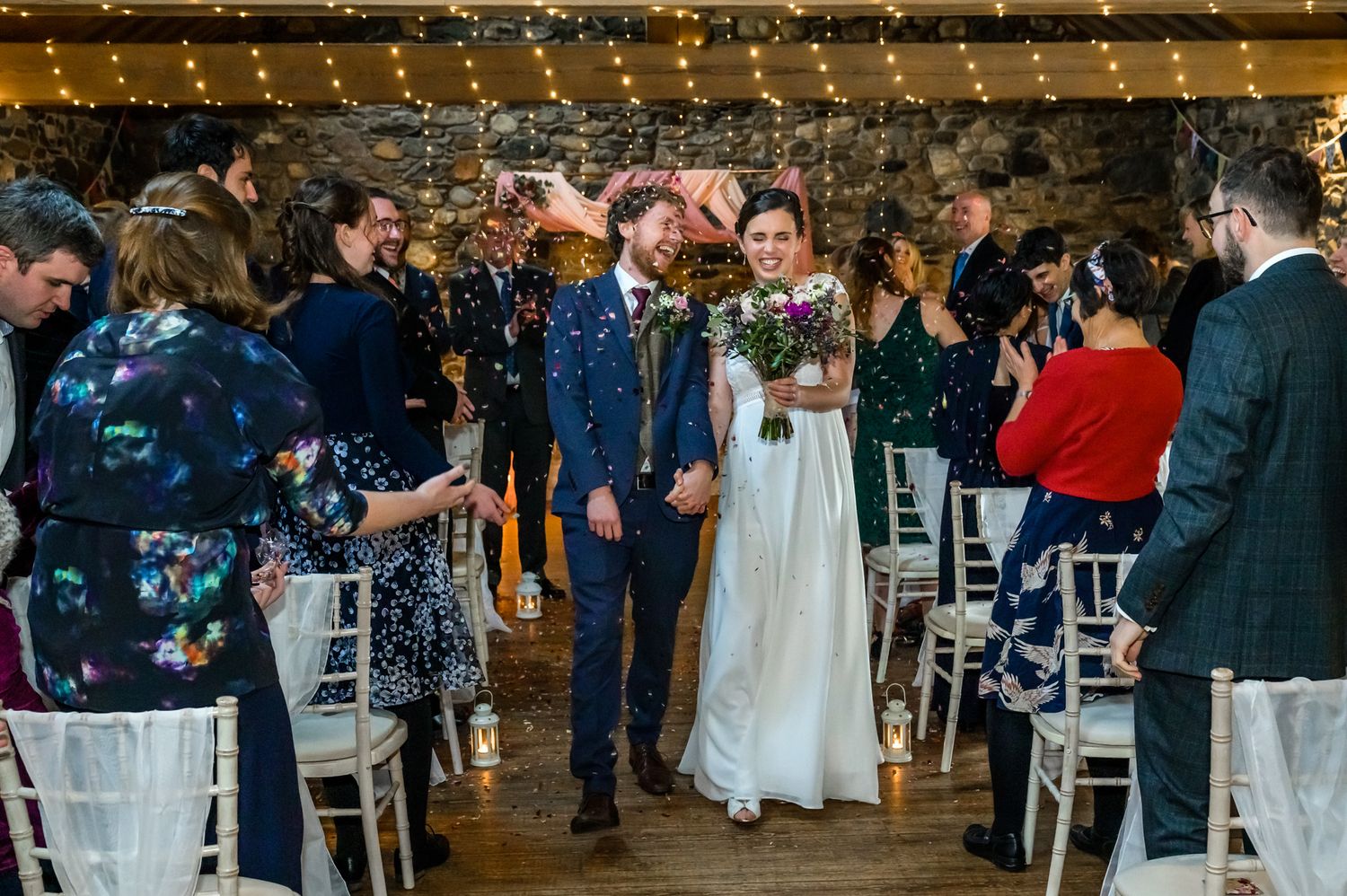 Confetti exit after wedding ceremony at Low Hall The Lakes