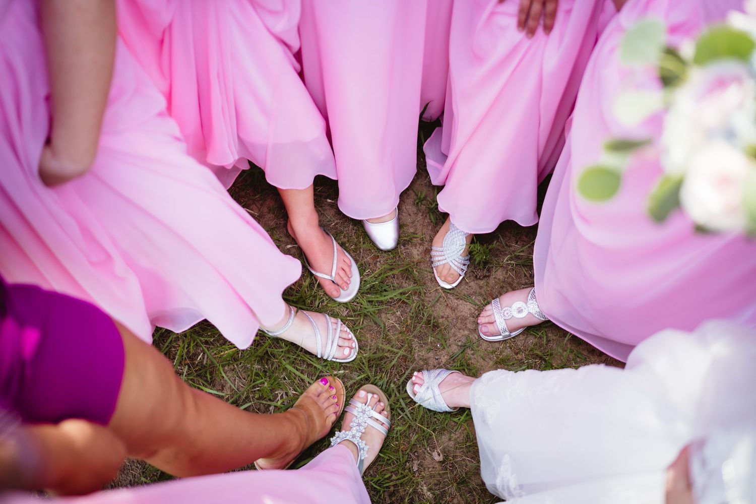 Guests create game countdown number signs and decorations in pink for an event.