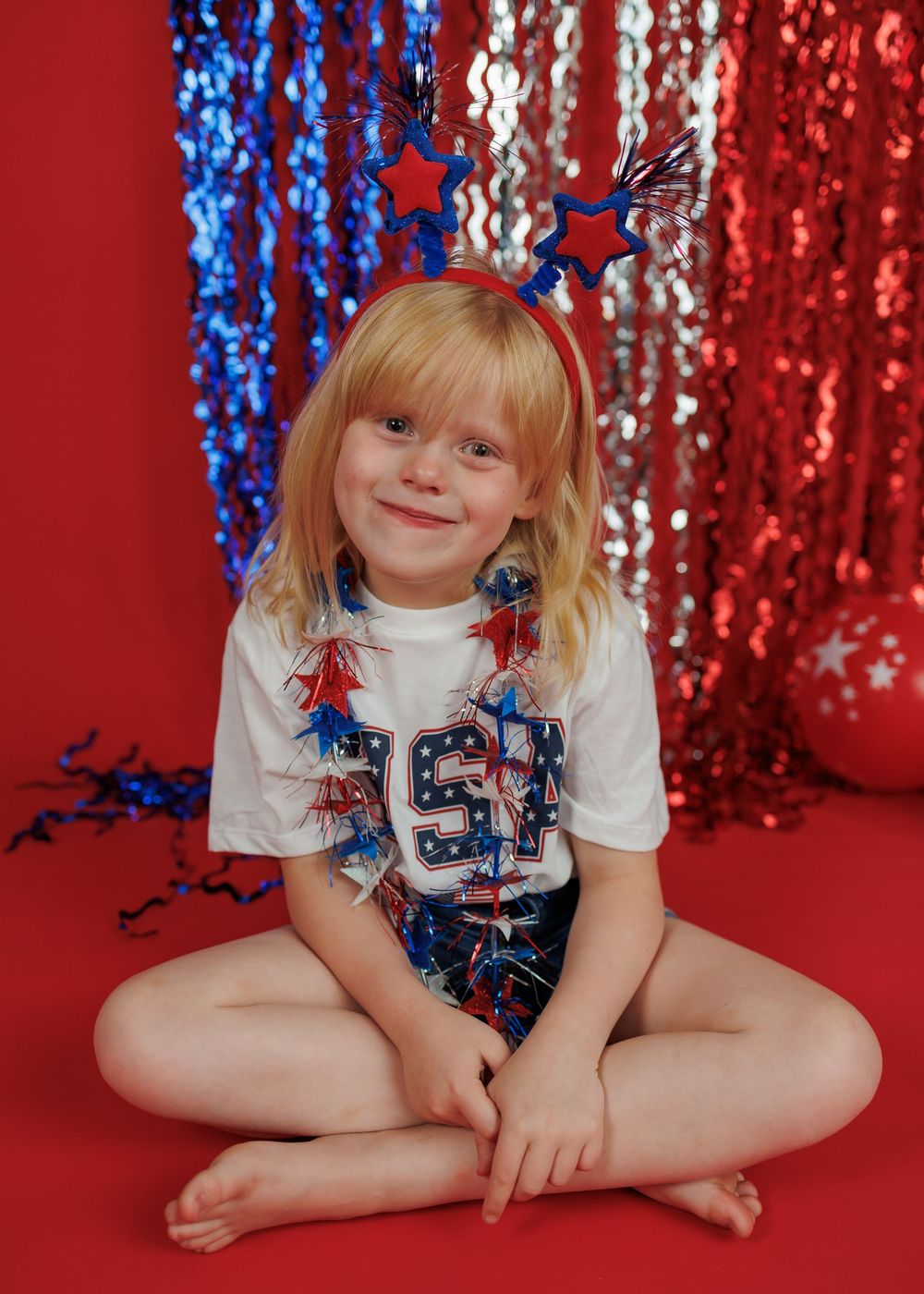 Young person in patriotic outfit posing against sparkly red and blue backdrop in progressive photo sequence.