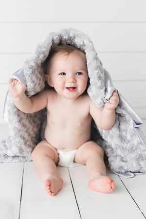 Baby boy's 1st birthday photoshoot in Menifee CA with Minky Couture blanket.