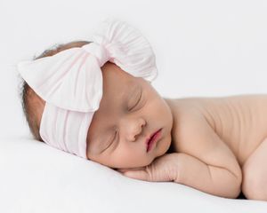 Professional photography portrait of sleeping newborn baby.