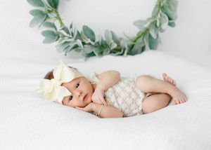 Cute baby girl photo by professional newborn photographer in Riverside county.