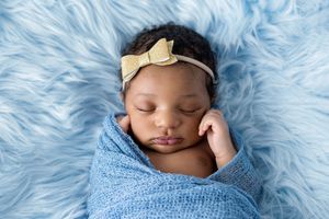 Beautiful portrait of newborn baby girl by Emily Menzie Photography, professional photographer in Riverside county.