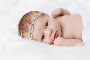 Portrait of newborn baby girl by Emily Menzie Photography, professional baby photographer in Menifee.
