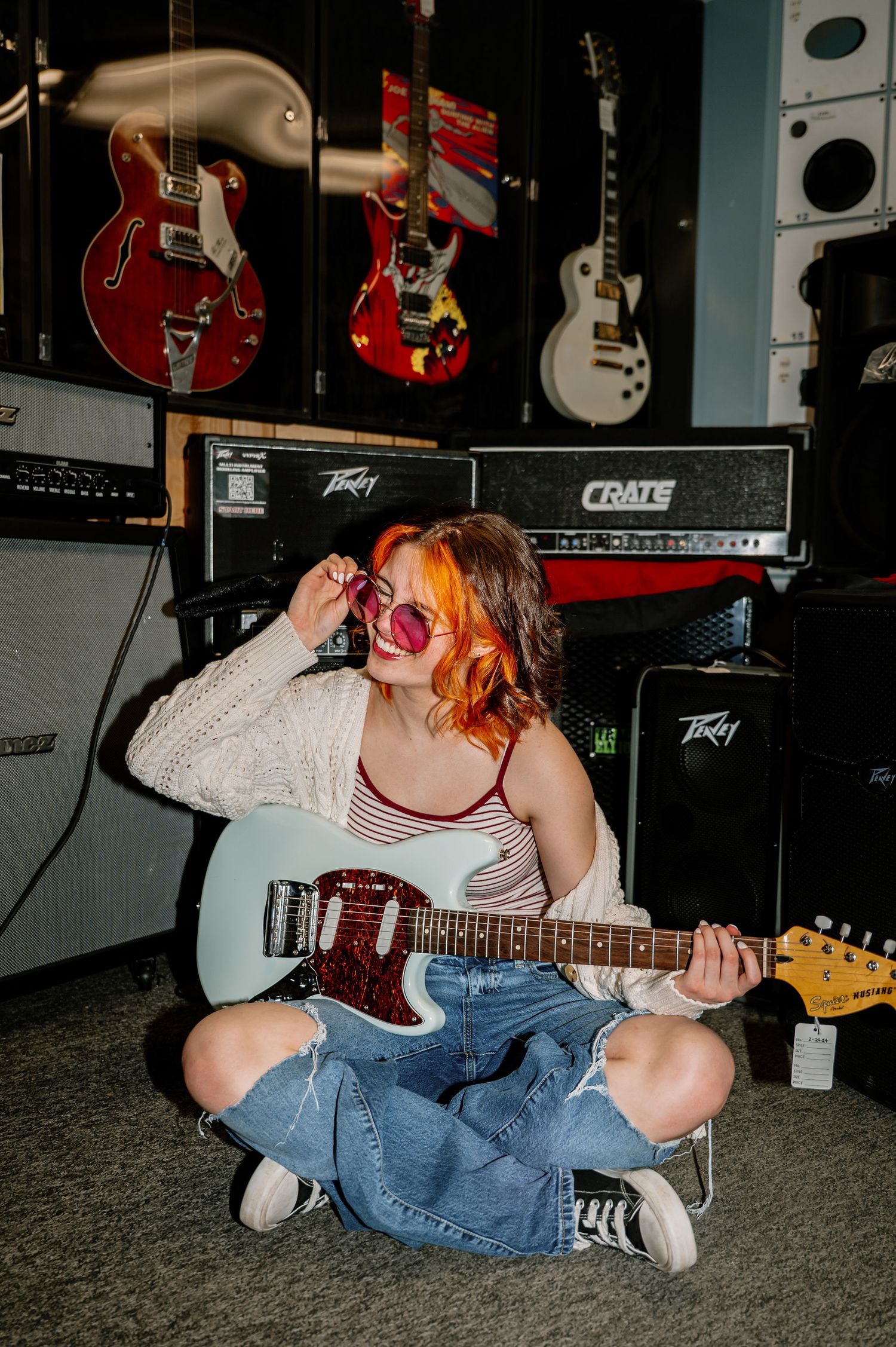 Fun senior photos with an electric guitar at Hot Poop in Walla Walla