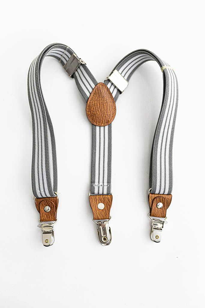 Gray and white striped baby suspenders for first birthday photoshoot in Lake Elsinore.