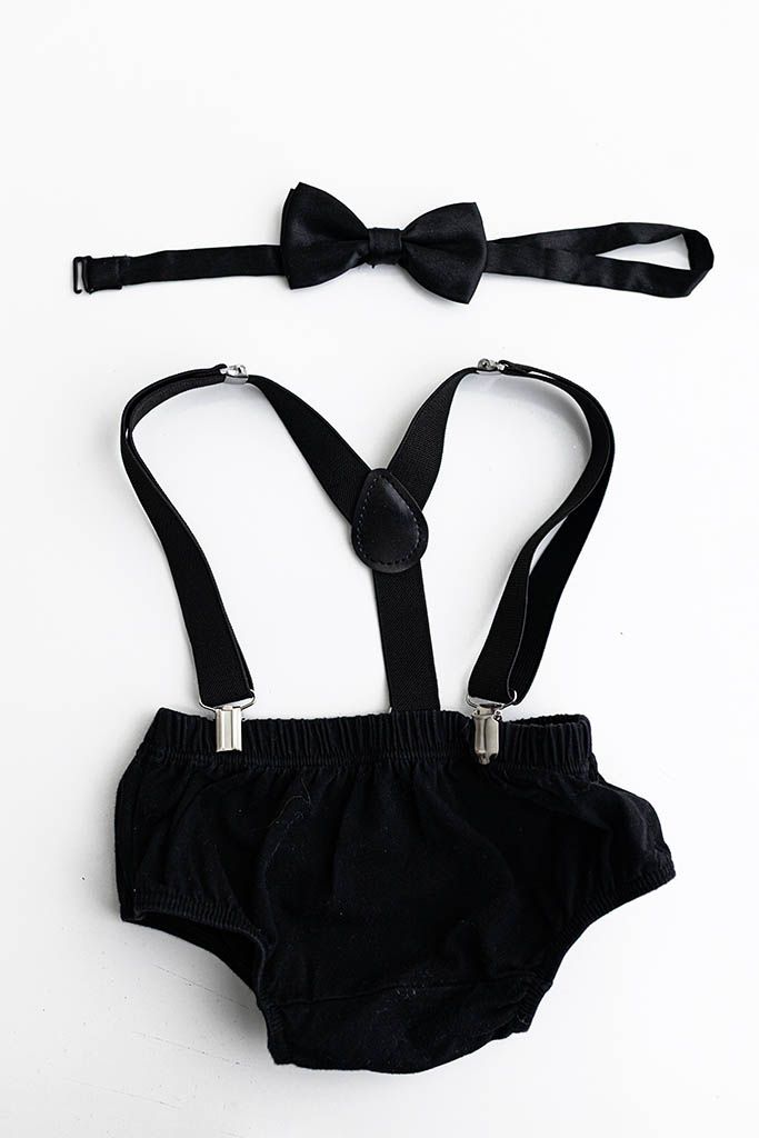 Black baby cake smash outfit set with bow tie, suspenders, and diaper cover.