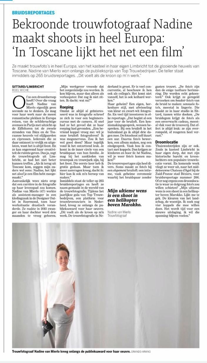 Award-winning wedding photographer Nadine van Mierlo poses confidently in a light-colored outfit for a newspaper feature article.