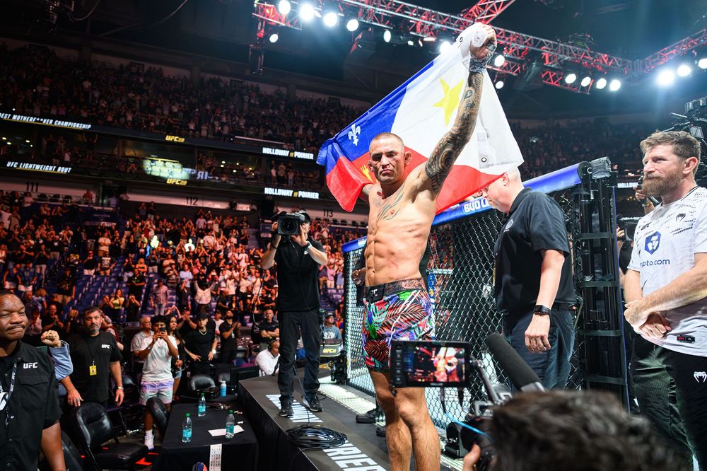 UFC fighters pose with flags after a match as crowds and bright lights fill the arena.