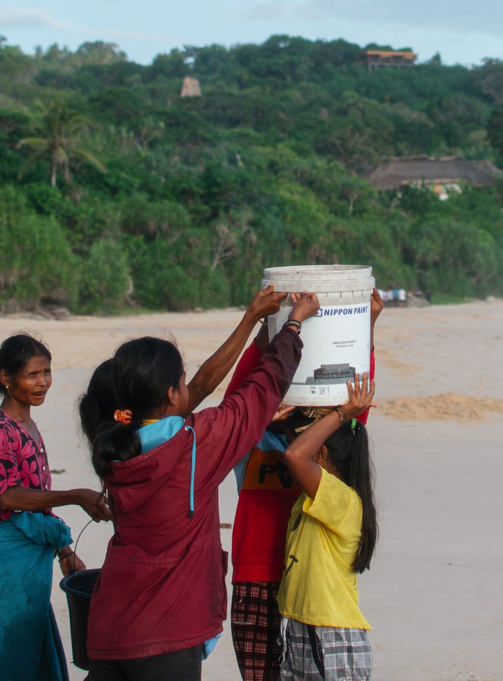 Local children on Nihiwatu Beach, at NIHI Sumba, Indonesia