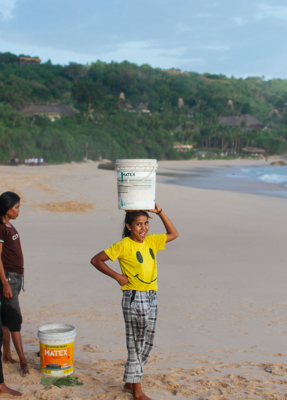 Local child on Nihiwatu Beach, at NIHI Sumba, Indonesia.