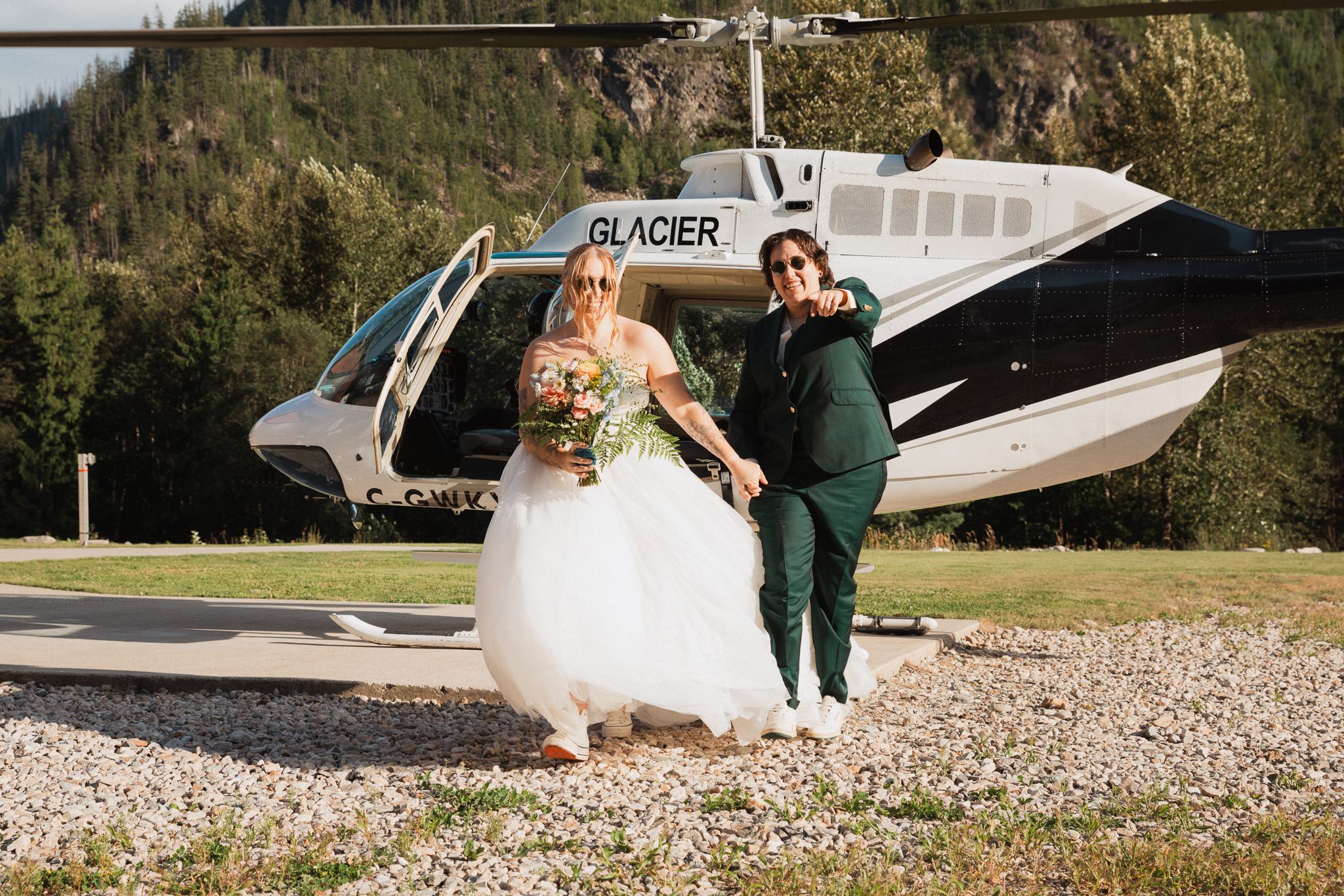 This was a fairytale elopement in Revelstoke, BC with Glacier Helicopters. The mountain top, skyline, and pastel wildflowers were a dream!