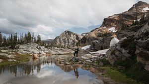 This was a fairytale elopement in Revelstoke, BC with Glacier Helicopters. The mountain top, skyline, and pastel wildflowers were a dream!