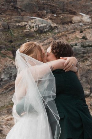 This was a fairytale elopement in Revelstoke, BC with Glacier Helicopters. The mountain top, skyline, and pastel wildflowers were a dream!