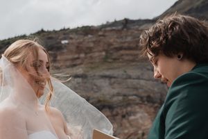 This was a fairytale elopement in Revelstoke, BC with Glacier Helicopters. The mountain top, skyline, and pastel wildflowers were a dream!