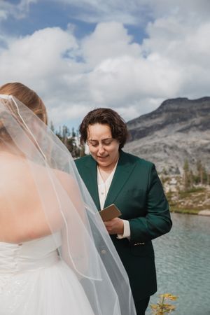 This was a fairytale elopement in Revelstoke, BC with Glacier Helicopters. The mountain top, skyline, and pastel wildflowers were a dream!