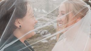 This was a fairytale elopement in Revelstoke, BC with Glacier Helicopters. The mountain top, skyline, and pastel wildflowers were a dream!
