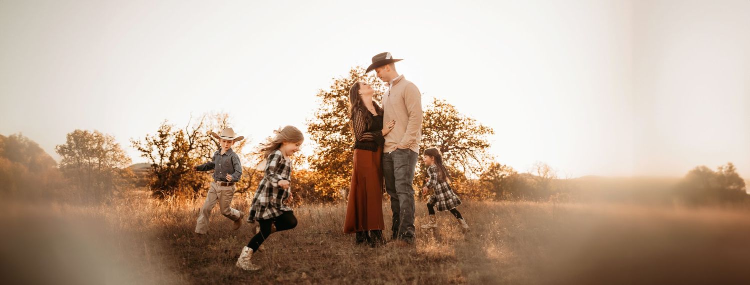 Wichita Wildlife Mountains Refuge Paul Family Photoshoot Session, siblings, mother father, fields, mountain, beautiful skies